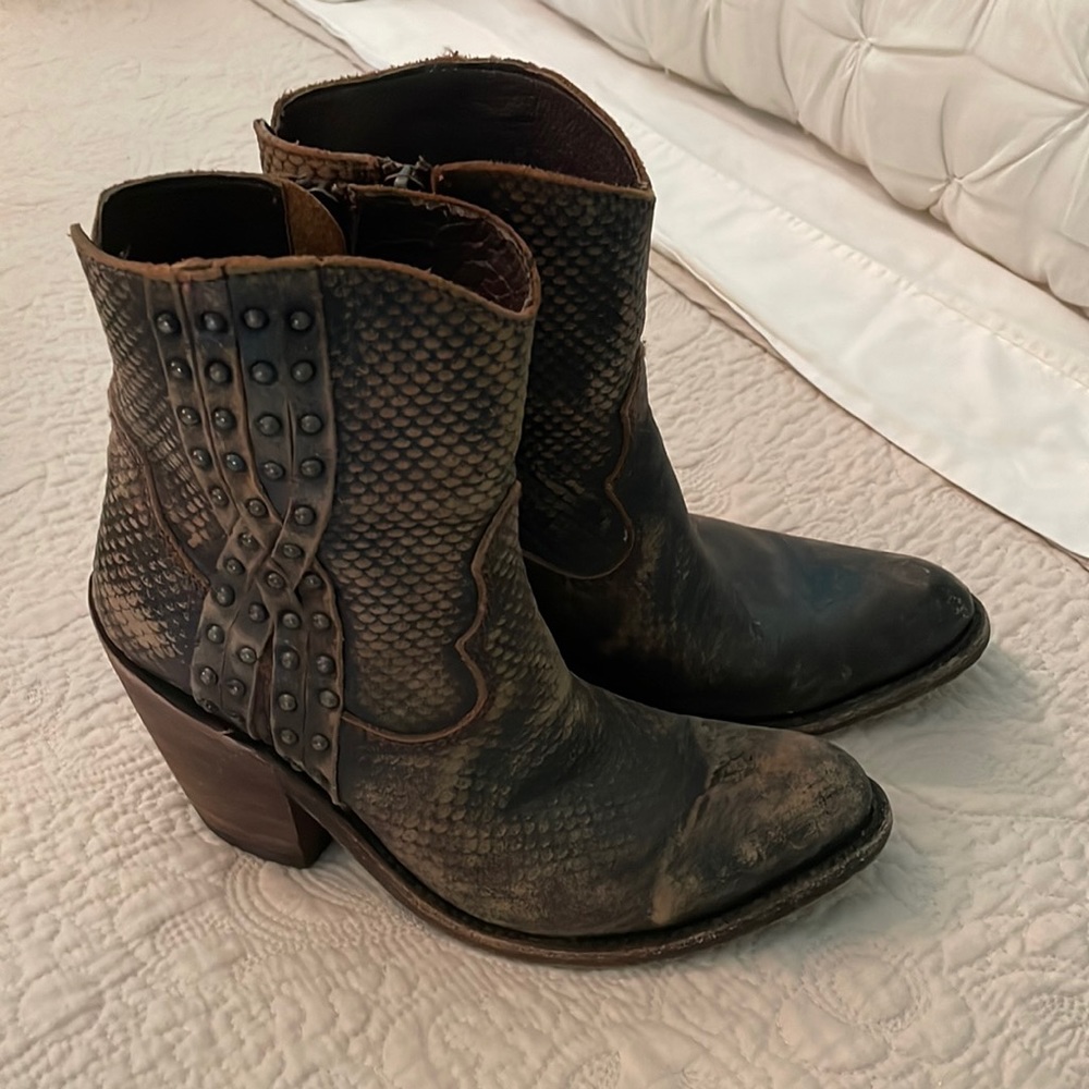 A distressed Liberty Black bootie in size 6